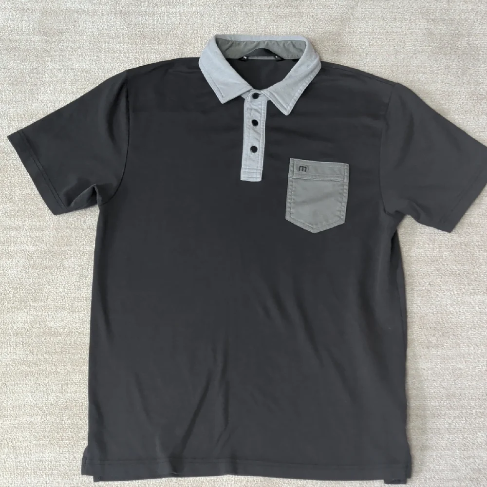 Travis Mathew Black Polo with Gray Accents - Picture 1 of 6